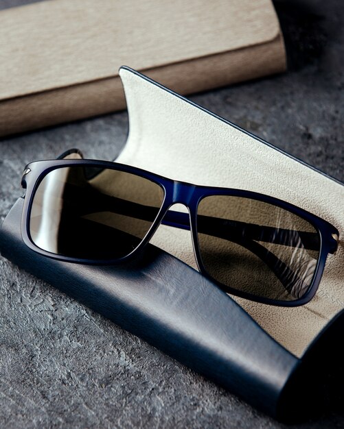 Sunglasses on the grey surface