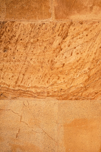 壁紙の建物の装飾や画面の太陽に照らされた大理石のスラブの垂直背景のアイデア