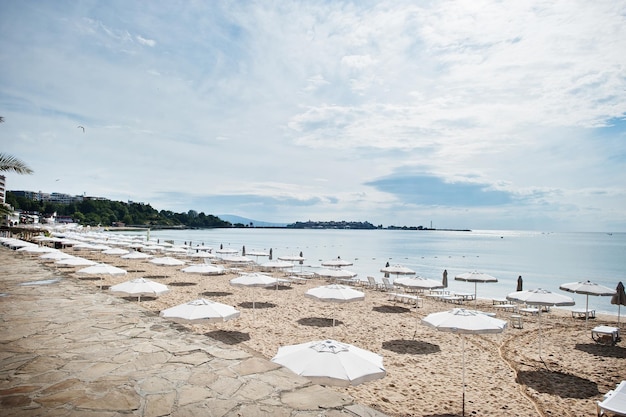 Sunny Beach on Black Sea in Bulgaria Summer vacation travel holiday Sunbeds