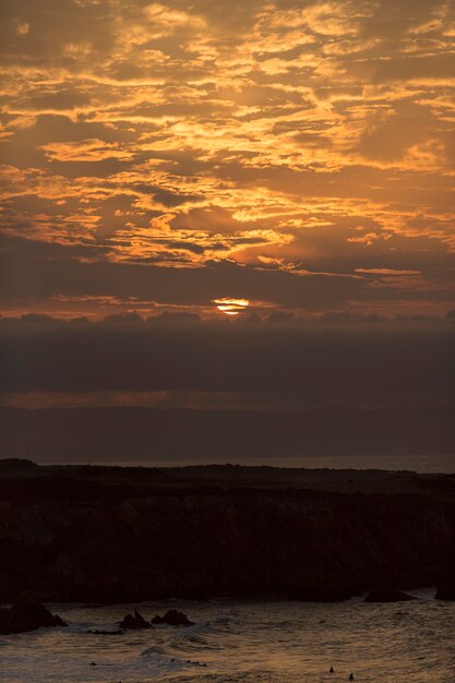 Sunset sky with clouds background