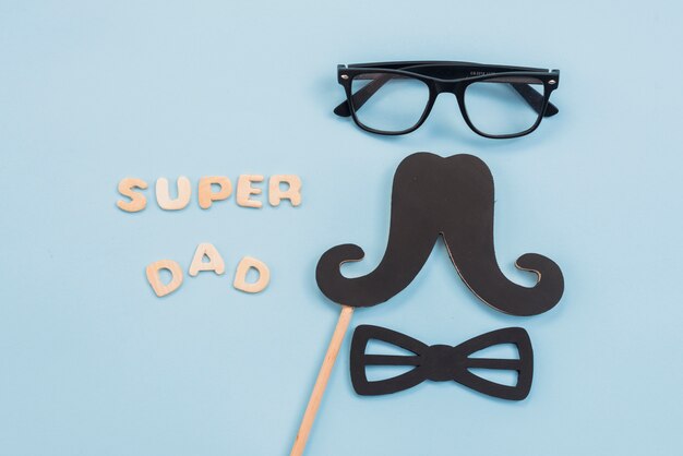 Super dad inscription with glasses and mustache