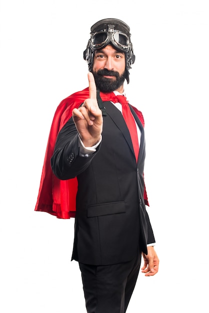 Free photo super hero businessman counting one