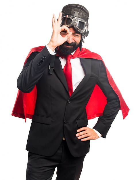 Free photo super hero businessman doing a joke