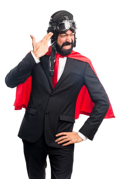 Super hero businessman making suicide gesture