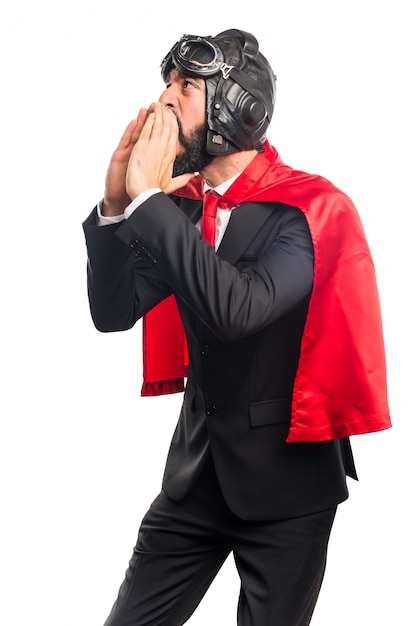 Super hero businessman shouting