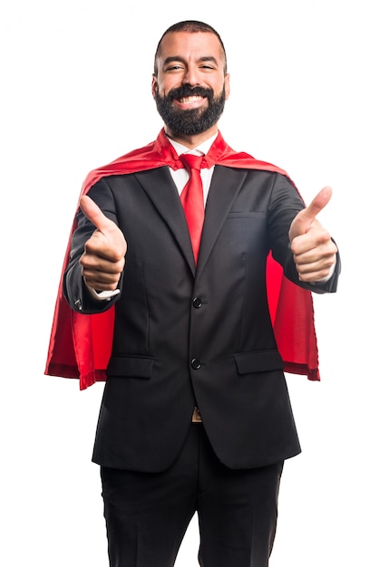 Free photo super hero businessman with thumb up