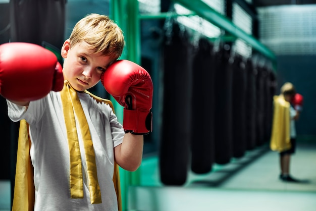 Free photo superhero champion boxer boy strength fighter concept