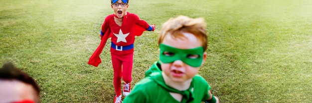 Free photo superhero kids aspiration imagination playful fun concept