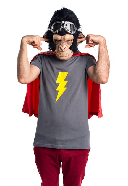 Superhero monkey man covering his ears