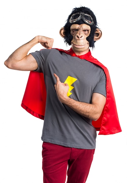 Superhero monkey man making strong gesture