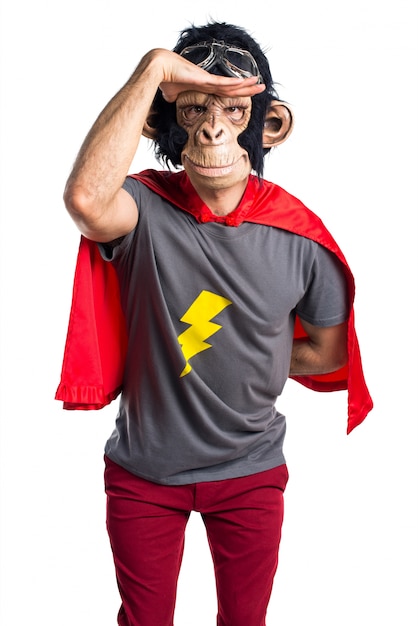Superhero monkey man showing something