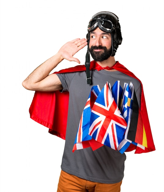 Superhero with a lot of flags listening something