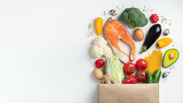 Supermarket. paper bag full of healthy food.