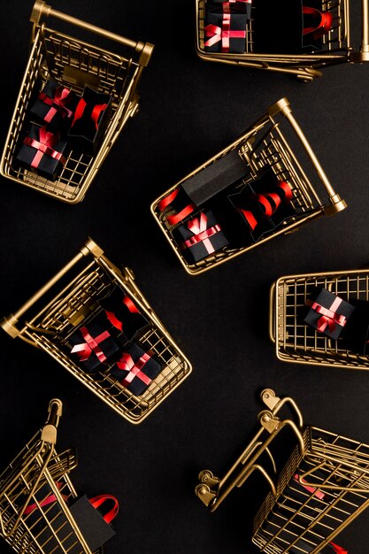 Supermarket trolleys filled with black friday promotional products