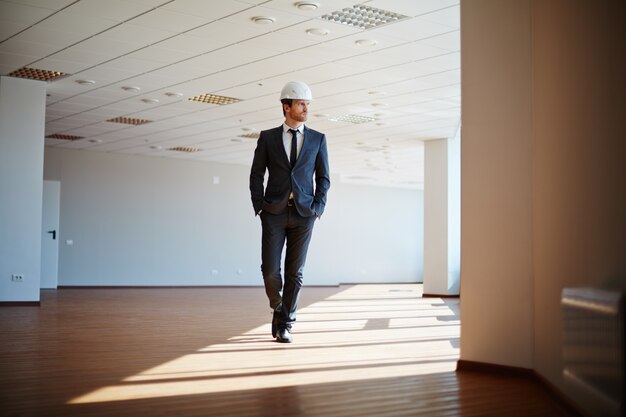 Supervisor checking the interior of the building