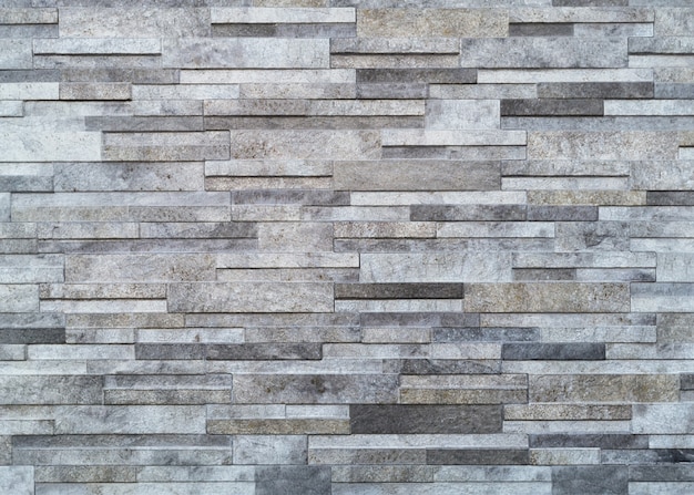 Surface white wall of stone wall gray tones 