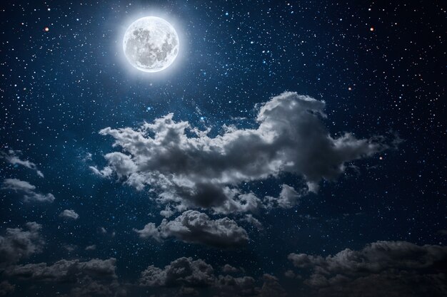 星と月と雲と夜の空 プレミアム写真