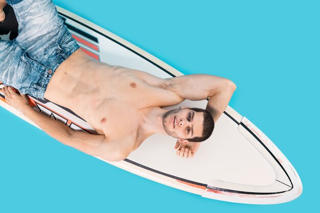 Surfer man posing 