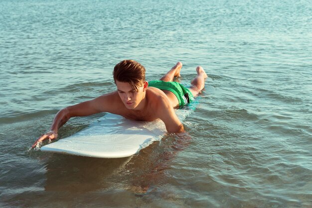 Surfer with board