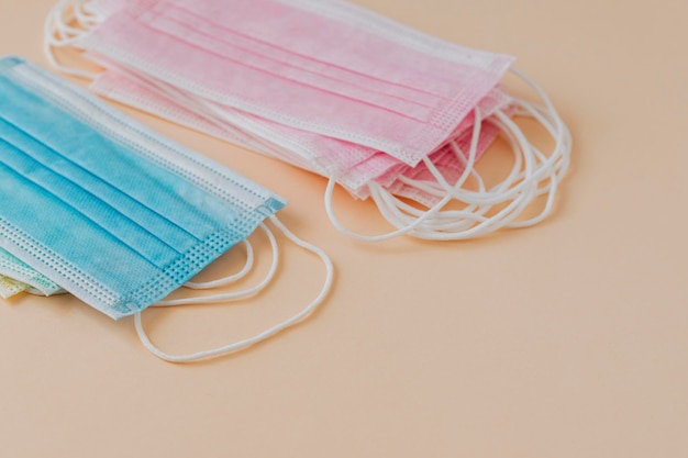 Surgical mask collectio on a beige background