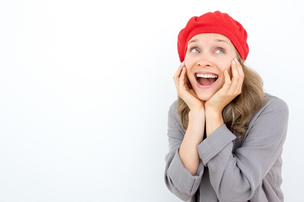 Surprised emotional French woman looking away