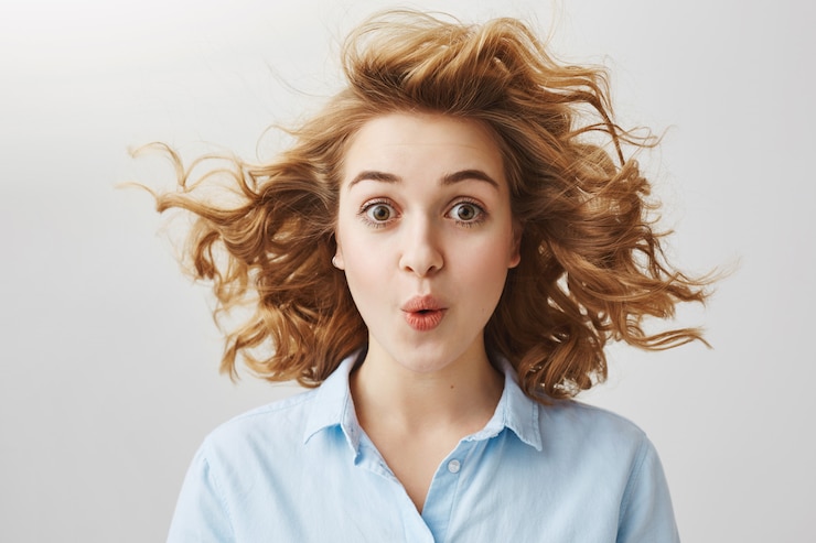 Free Photo surprised excited female looking impressed, saying wow