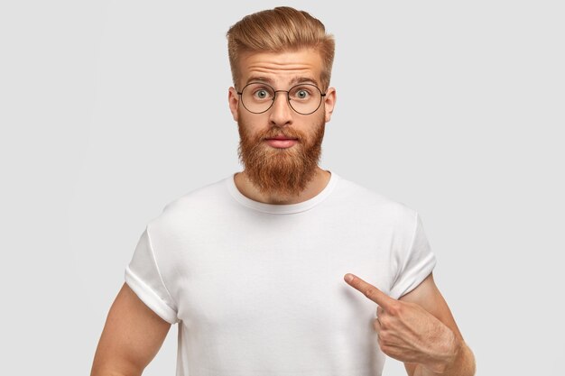 surprised ginger young man with shocked expression