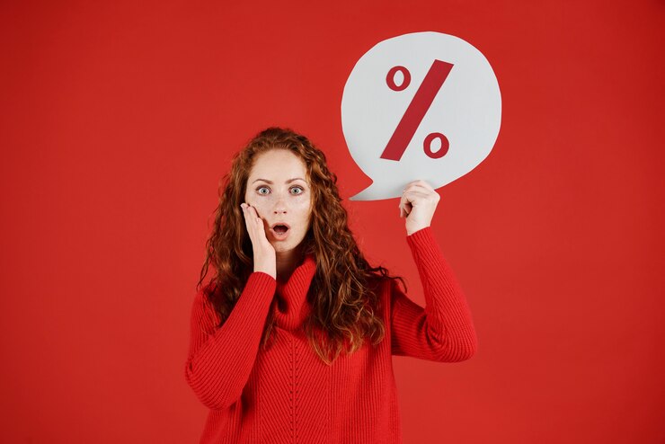 Free Photo surprised girl holding blank speech bubble