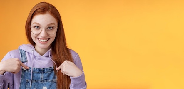 Surprised happy pleased happy smiling young redhead girl getting awesome proposal grinning questione