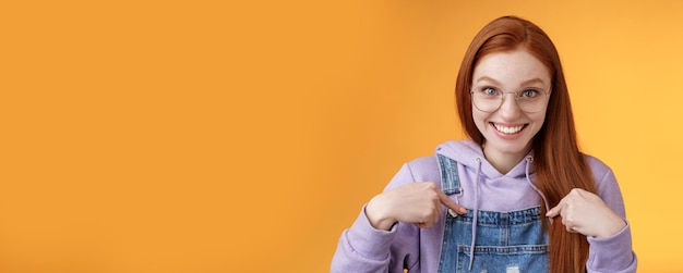 Free photo surprised happy pleased happy smiling young redhead girl getting awesome proposal grinning