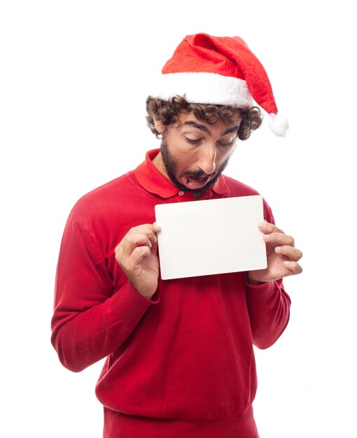 Surprised man holding a blank sign in front of his chest