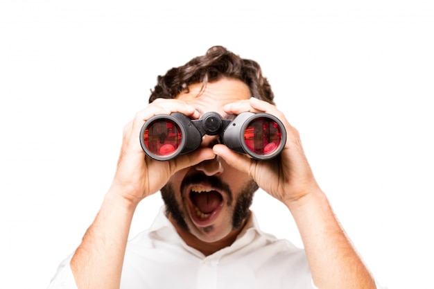 Surprised man with binoculars