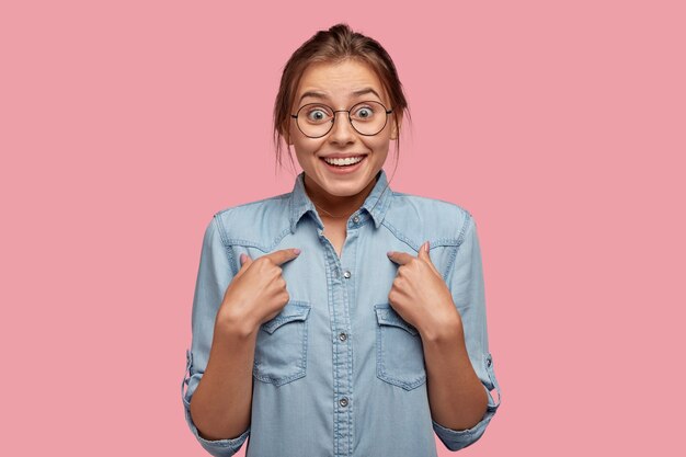 Surprised positive pupil has dark combed hair