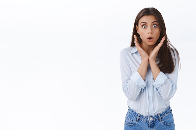 Surprised young lady realise something shocking happened