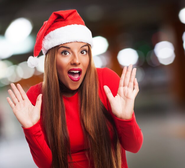 Surprised young woman with abstract background