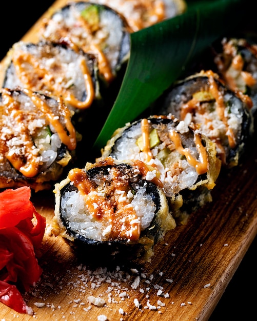 Sushi nori on a wooden board.