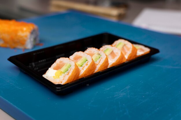 Sushi order arrangement in a restaurant kitchen