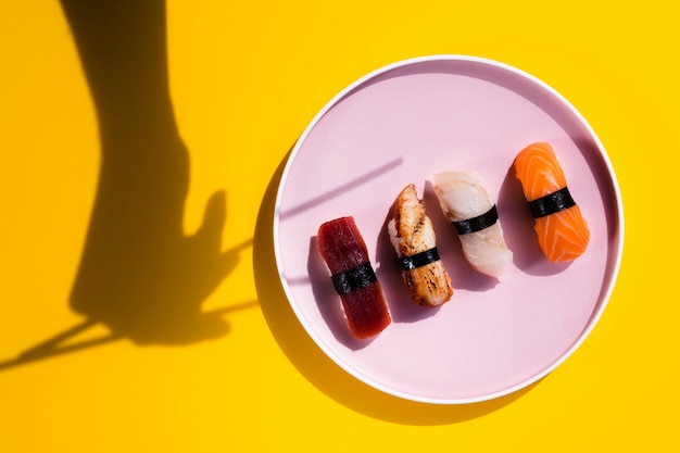 Sushi plate with chopsticks shadow