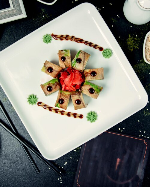 Sushi rolls served on plate