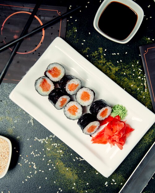 Sushi rolls on square plate