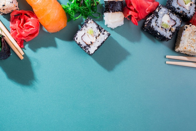 Sushi rolls on table with copy-space