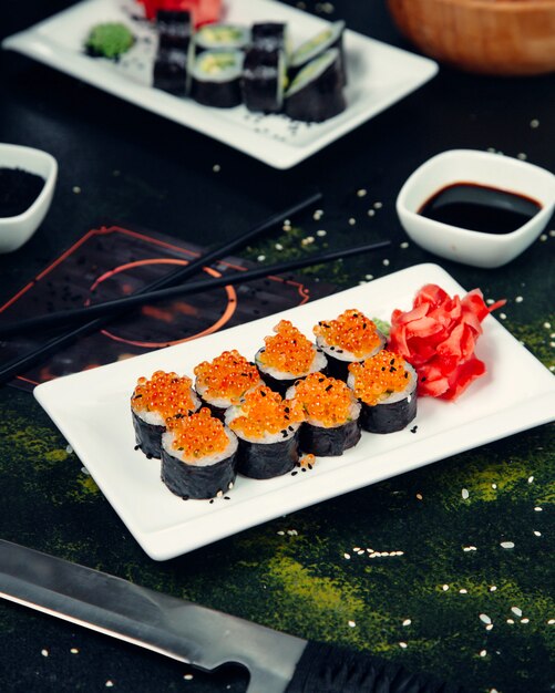 Sushi rolls topped with caviar