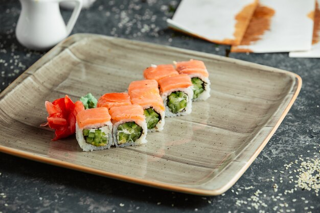 Sushi rolls with salmon and cucumber