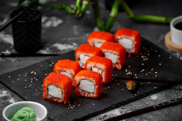 Sushi set with red caviar on the table