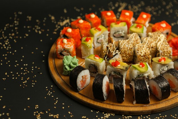 Sushi set with salmon prawn tuna vegetables side view