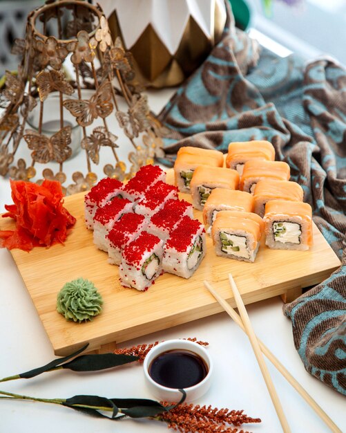 A sushi set with smoked salmon cucumber and japanese mayonnaise