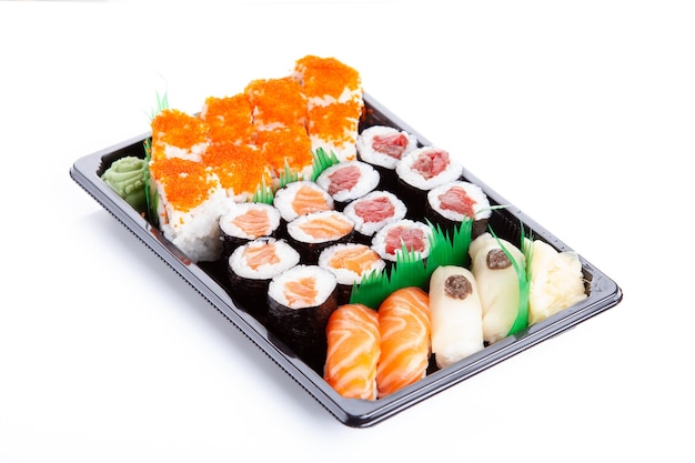 Sushi tray with makis and tuna nigiris and salmon view from above