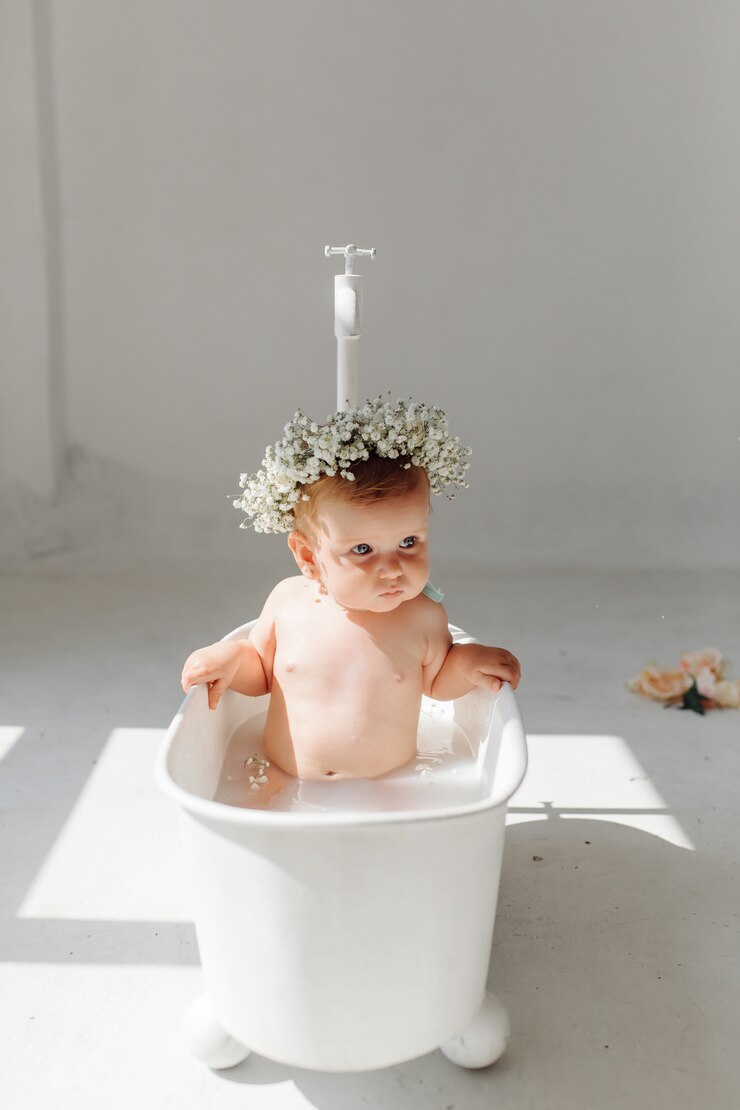 Free Photo sweet baby girl in bathroom