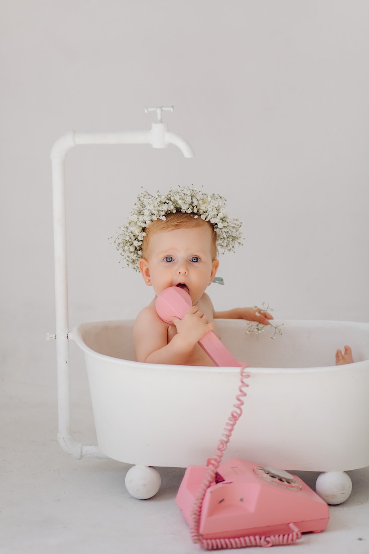 Free Photo sweet baby girl in bathroom