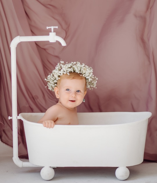 Sweet baby girl in bathroom